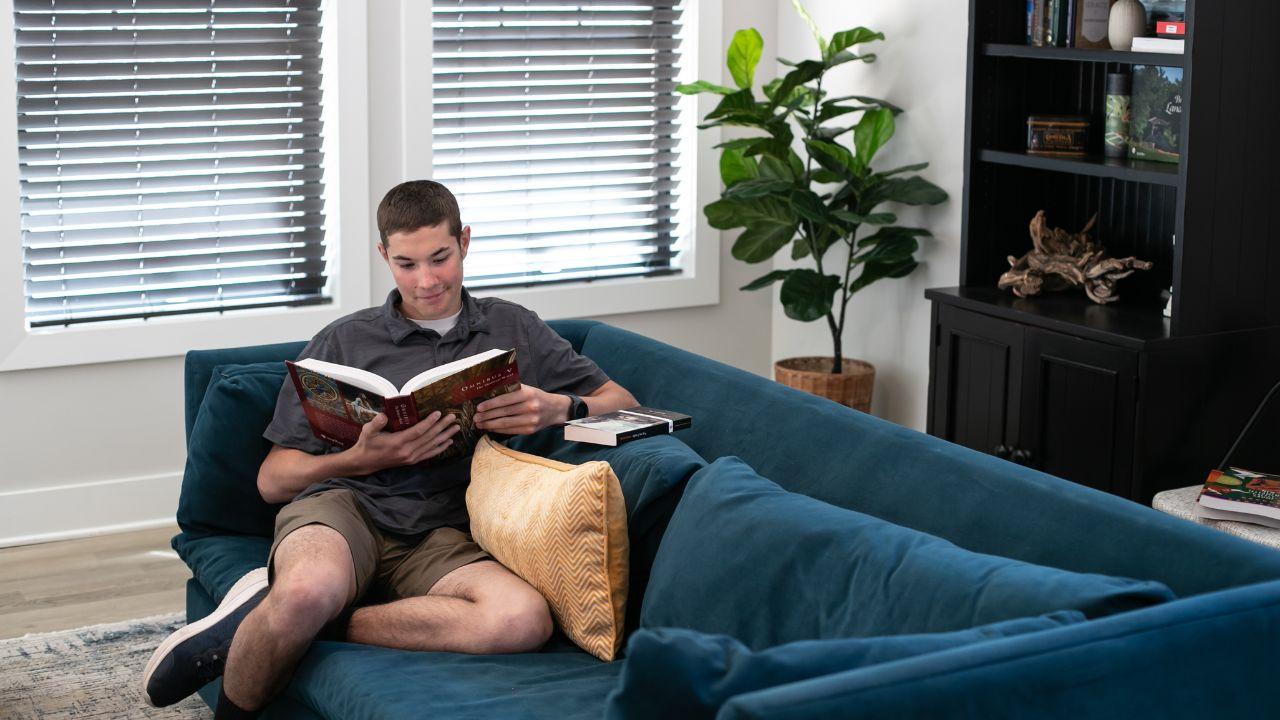 Classical Student Reads a Book