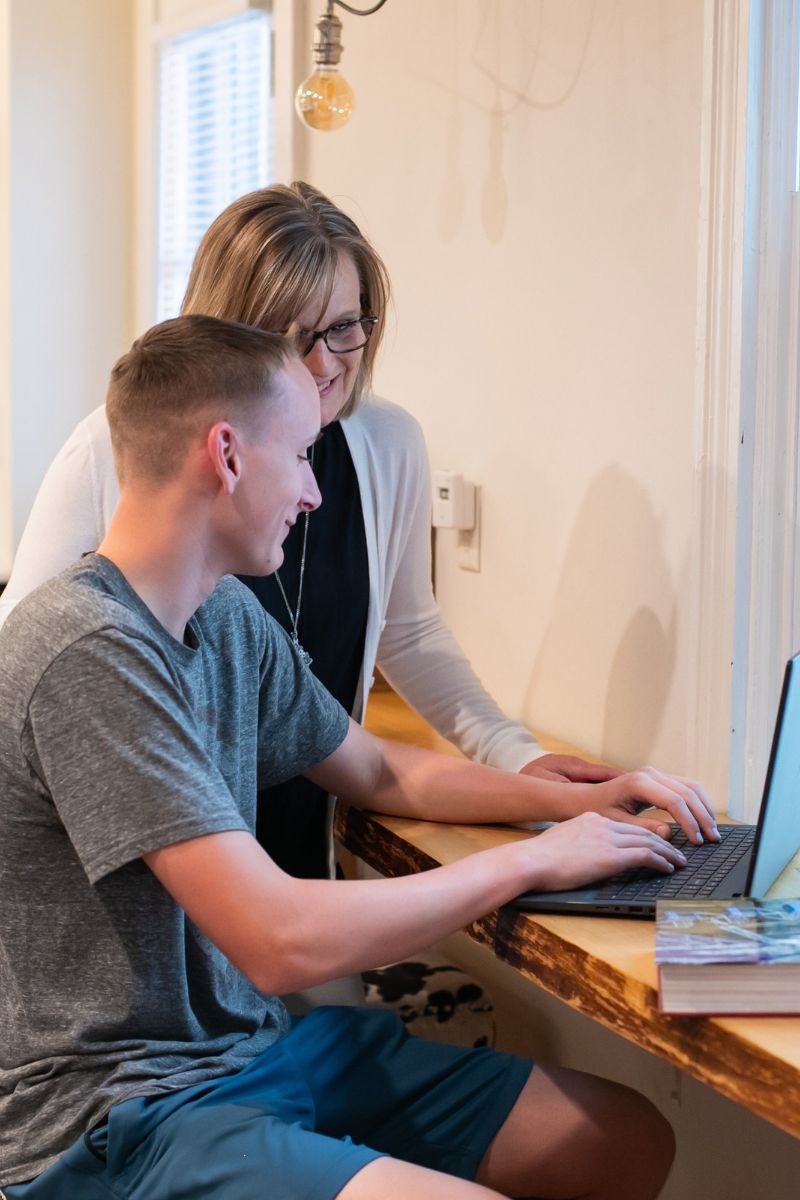 Educational Philosophy mother son studying