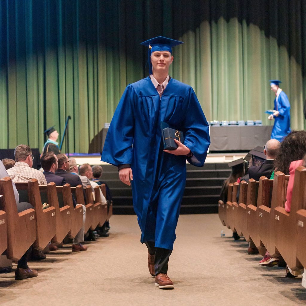 vsa graduate walking